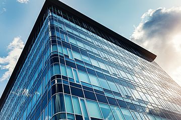 modern urban business building window wall against blue sky